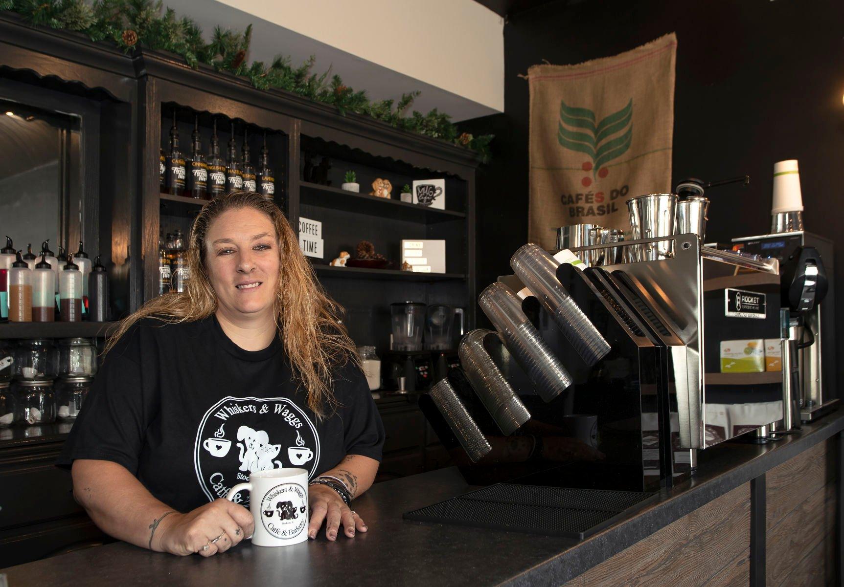 Owner Tina Boop behind the counter at Whiskers and Wags Catfe and Bakery in Stockton, Ill., on Saturday, July 9, 2022.    PHOTO CREDIT: Stephen Gassman