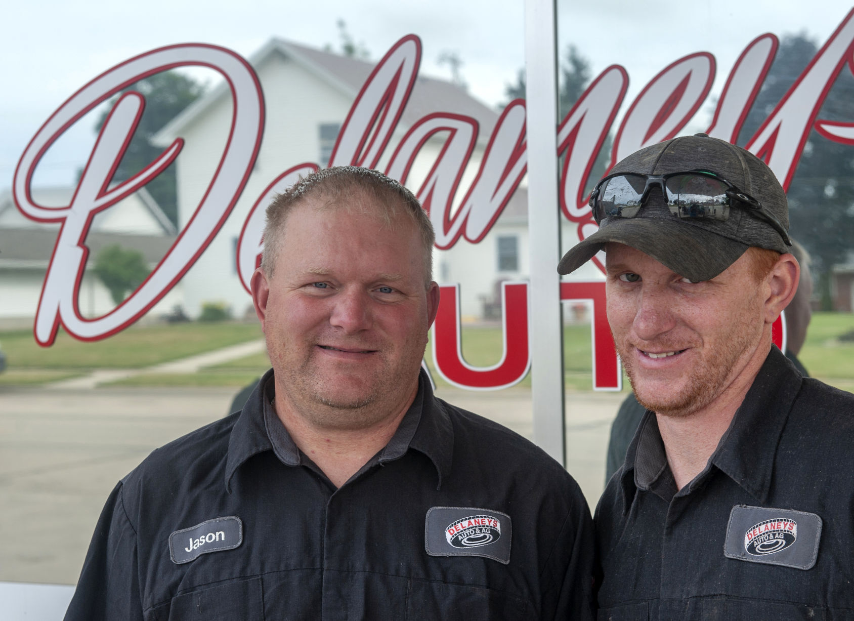 Entrepreneurial brothers, Jason and Matt Delaney, stand together at their Farley location.    PHOTO CREDIT: Dave LaBelle