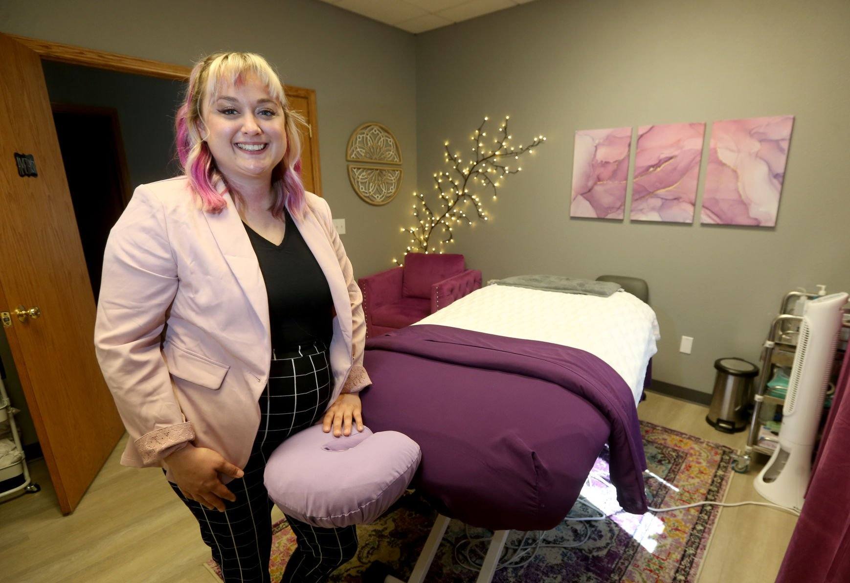 Owner Kat Brosnan shows off a spa room at Renew from Within in Dubuque on Monday.    PHOTO CREDIT: JESSICA REILLY