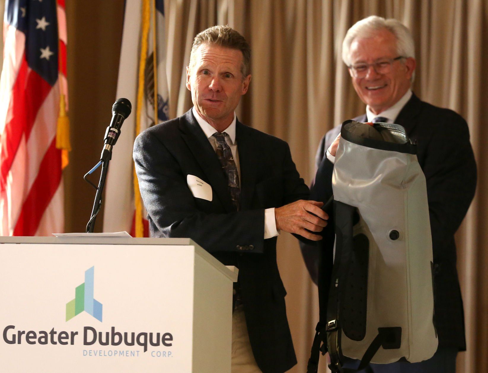 Tim Hodge (left), board chairman of Greater Dubuque Development Corp., speaks during the organization