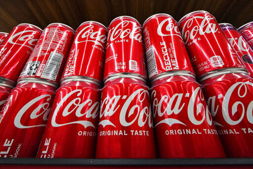 Coca-Cola posted higher-than-expected sales in the second quarter today due to price increases and continuing improvement in demand at restaurants and other venues. The Atlanta-based company said revenue grew 12% in the April-June period to $11.3 billion. (AP Photo/Gene J. Puskar)    PHOTO CREDIT: Gene J. Puskar