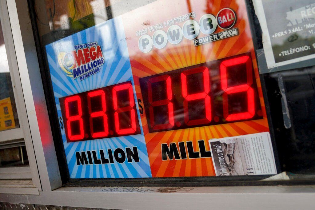 A giant Mega Millions lottery jackpot ballooned to $1.02 billion after no one matched all six numbers and won the top prize.    PHOTO CREDIT: John Minchillo