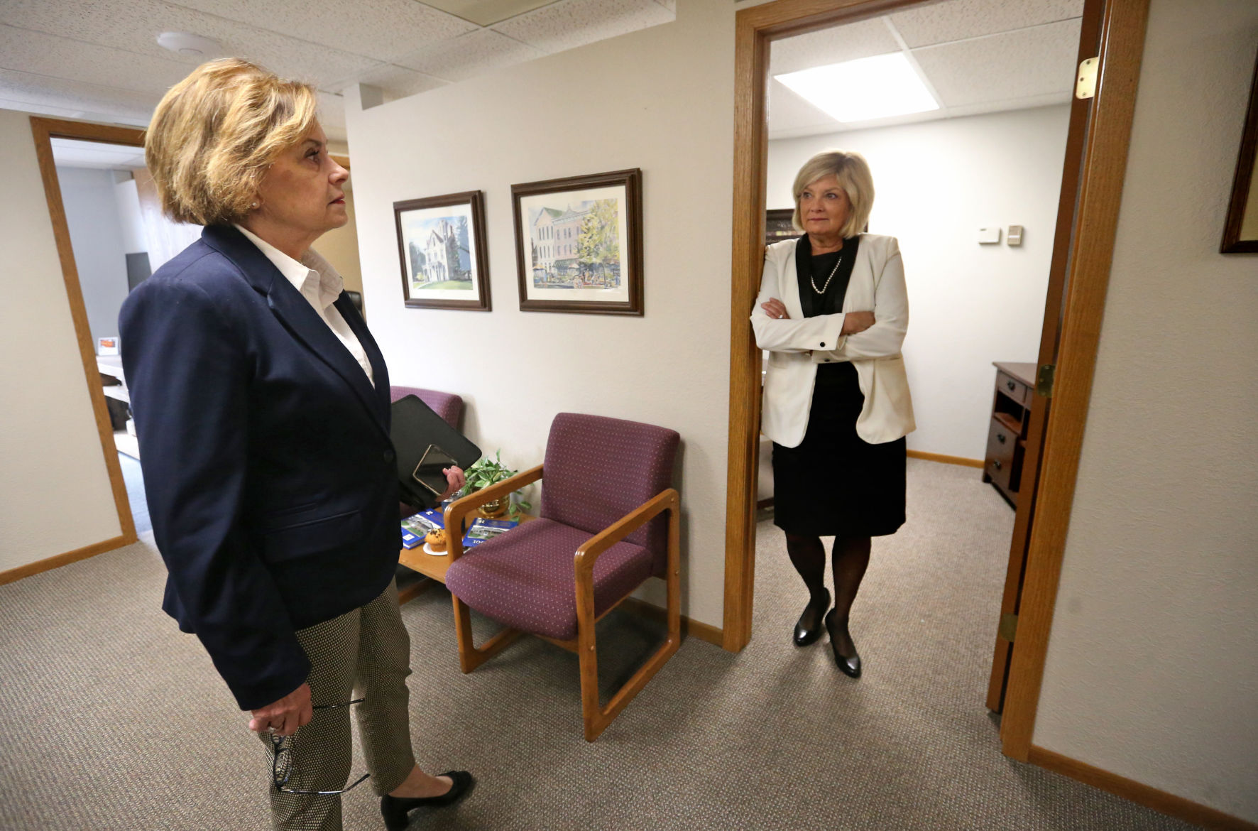 Peggy Nesler (left) and Shari Greenwood now own the Dubuque real estate office.    PHOTO CREDIT: JESSICA REILLY