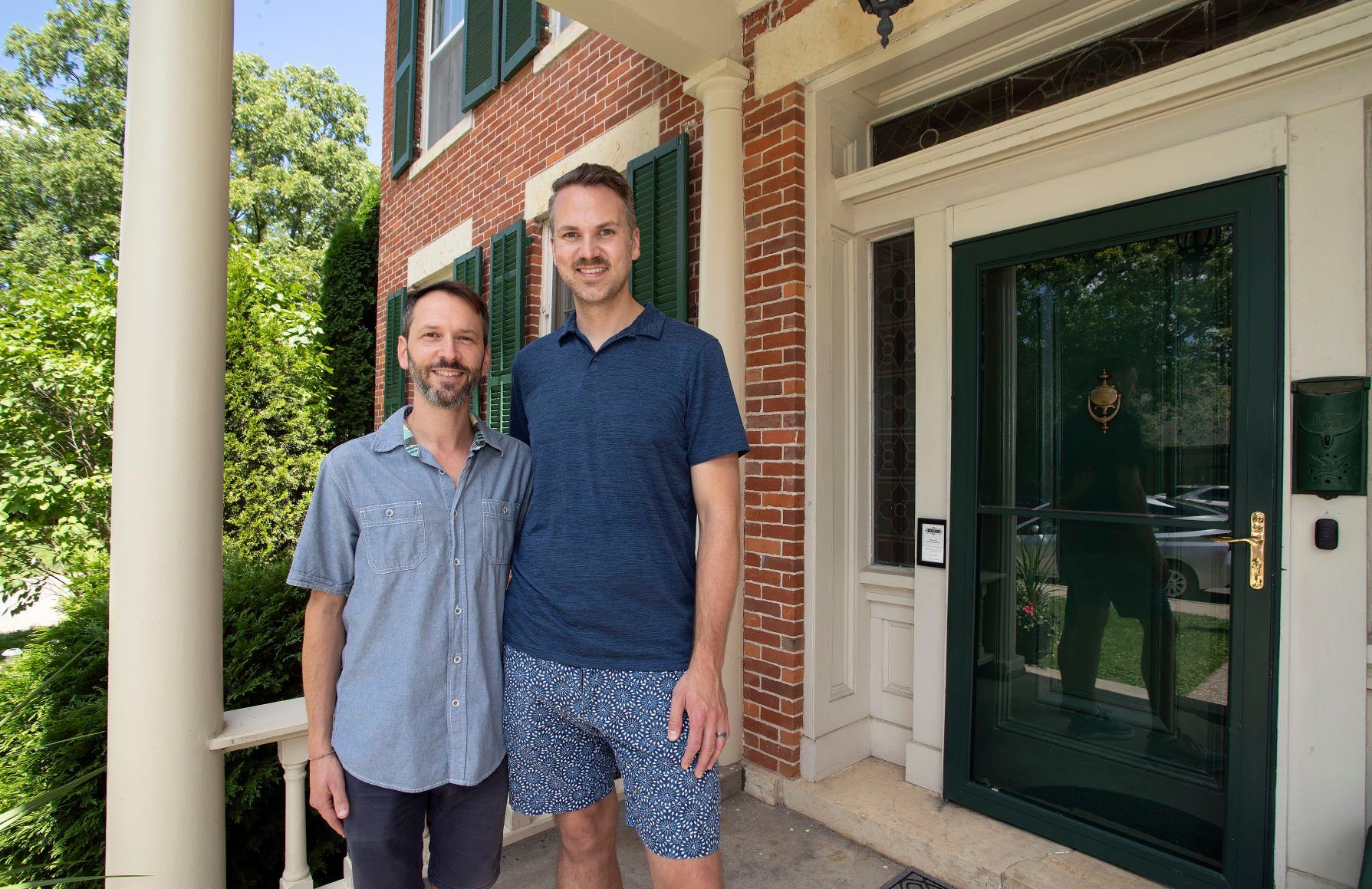 Innkeepers Robert (left) and Douglas Mahan operate Aldrich Guest House in Galena, Ill. They have been at the historic site for eight years. It won the TripAdvisor Traveler’s Choice 2022 “Best of the Best” award.    PHOTO CREDIT: Stephen Gassman