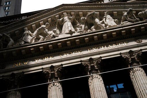 FILE - Statues adorn the facade of the New York Stock Exchange Thursday, July 14, 2022, in New York. Stocks are opening slightly higher on Wall Street with gains spread widely across sectors on Monday, Aug. 8, 2022. (AP Photo/John Minchillo, File)    PHOTO CREDIT: John Minchillo