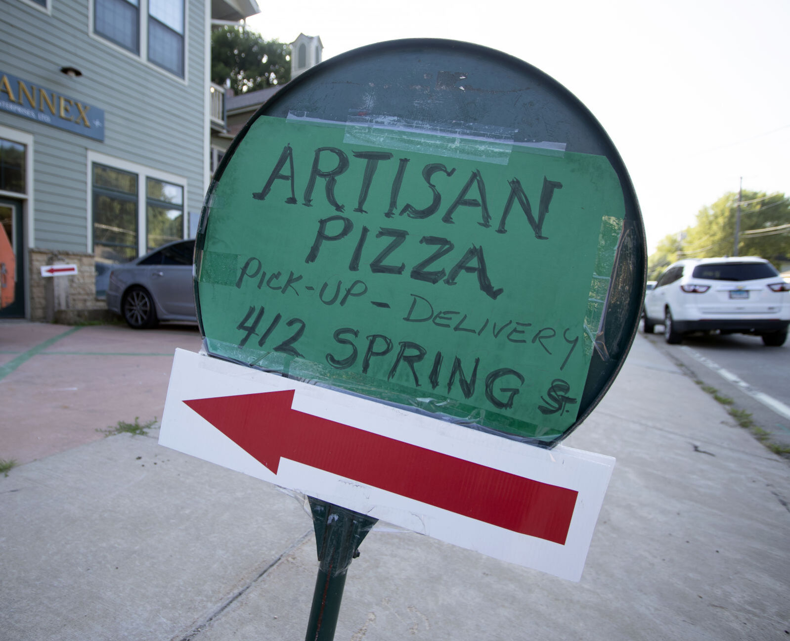Sign for Artisan Pizza along Spring Street in Galena, Ill., on Friday, August 5, 2022.    PHOTO CREDIT: Stephen Gassman