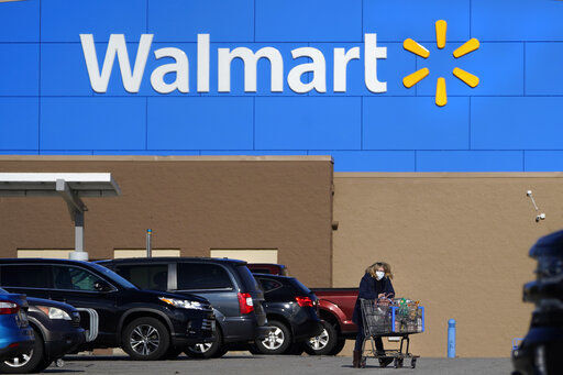 Walmart Inc. on Tuesday reported fiscal second-quarter net income of $5.15 billion. The Bentonville, Ark.-based company said it had profit of $1.88 per share. Earnings, adjusted for non-recurring gains, were $1.77 per share.     PHOTO CREDIT: Charles Krupa