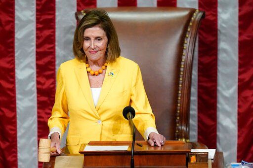 House Speaker Nancy Pelosi of Calif., finishes the vote to approve the Inflation Reduction Act in the House chamber at the Capitol in Washington, Friday, Aug. 12, 2022. A divided Congress gave final approval Friday to Democrats