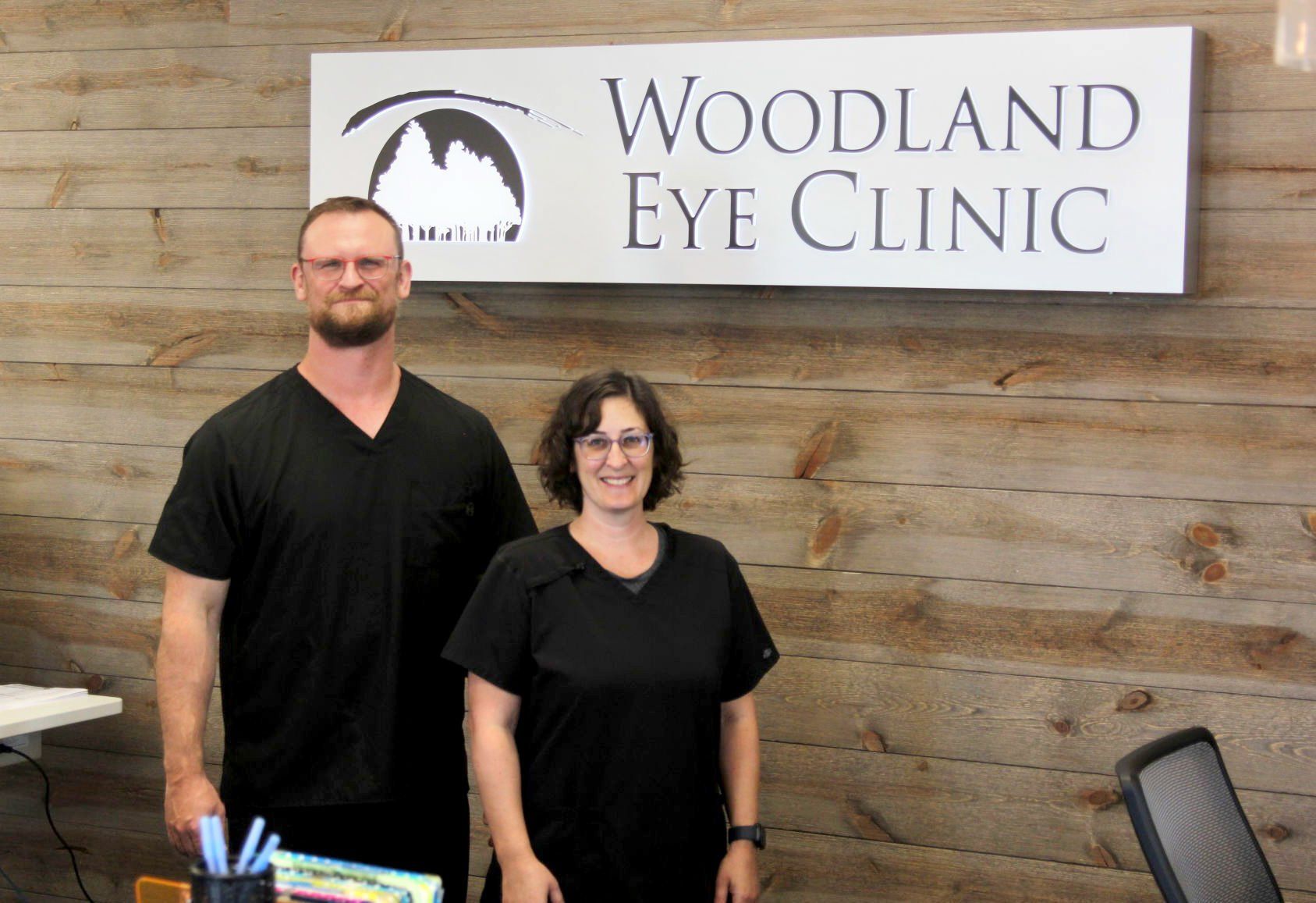 Dr. Josh Woodland (left) and Dr. Corey Kelly celebrate the opening of their new facilty, Woodland Eye Clinic in Dyersville, Iowa.    PHOTO CREDIT: Dylan Kurt