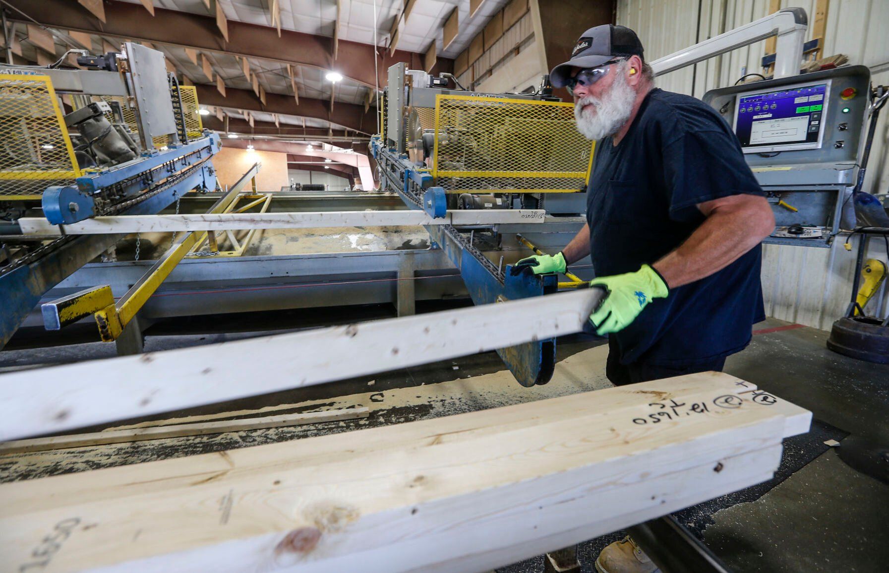Tom Wall works at Cascade Lumber Co. The Iowa business, founded in 1953 by Ray Noonan Sr., started as a lumber yard. Through the years, it expanded its building supply inventory, then moved into manufacturing trusses. Today, it has several Iowa offices and another in Tyler, Texas.    PHOTO CREDIT: Dave Kettering