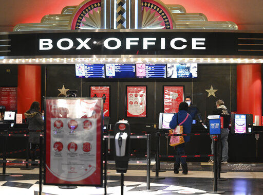 FILE - Movie theaters reopen after COVID-19 closures on March 5, 2021, in New York. For one day, Sept. 3, 2022, movie tickets will be just $3 in the vast majority of American theaters as part of a newly launched “National Cinema Day” to lure moviegoers during a quiet spell at the box office. (Photo by Evan Agostini/Invision/AP, File)    PHOTO CREDIT: Evan Agostini