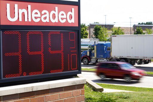 FILE - The price of regular unleaded gas is advertised for just under $4 a gallon at a Woodman