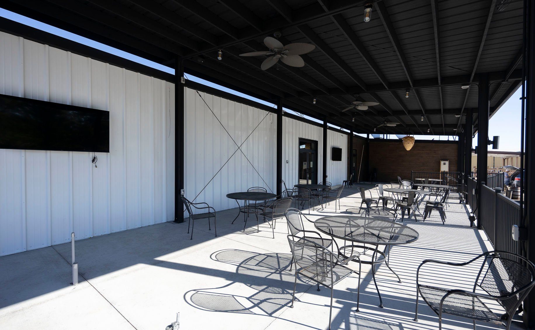 Outdoor patio seating at 7 Hills West in Dyersville, Iowa on Tuesday, Aug. 30, 2022.    PHOTO CREDIT: Stephen Gassman