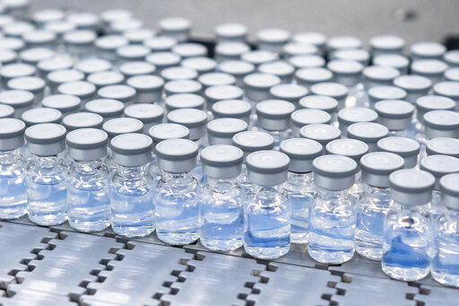 This August 2022 photo provided by Pfizer shows vials of the company