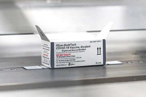 This August 2022 photo provided by Pfizer shows packaging for the company