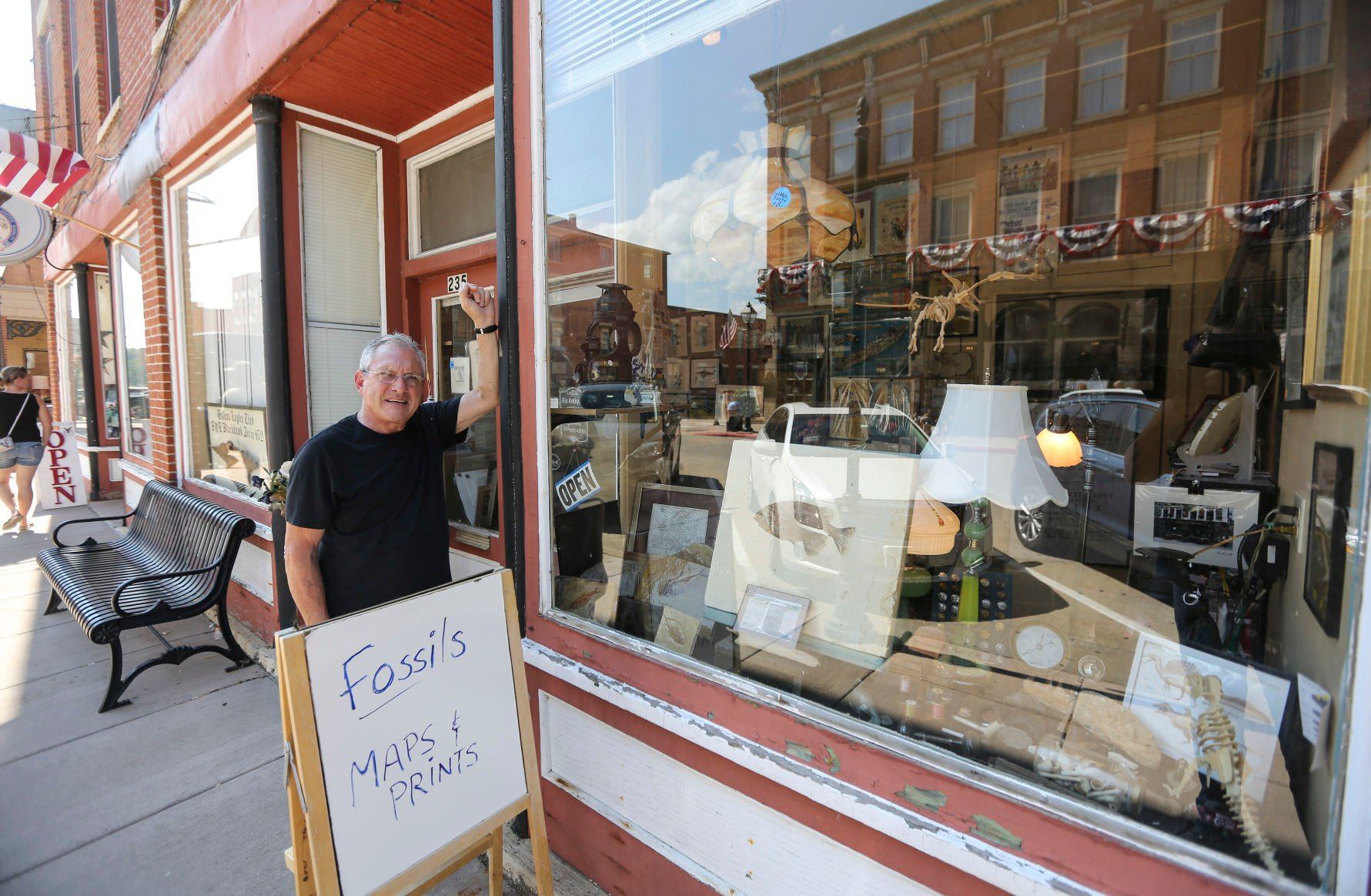 Owner Rick Pariser stands outside Rix Antiques on Main Street in Galena, Ill., on Friday.    PHOTO CREDIT: Dave Kettering