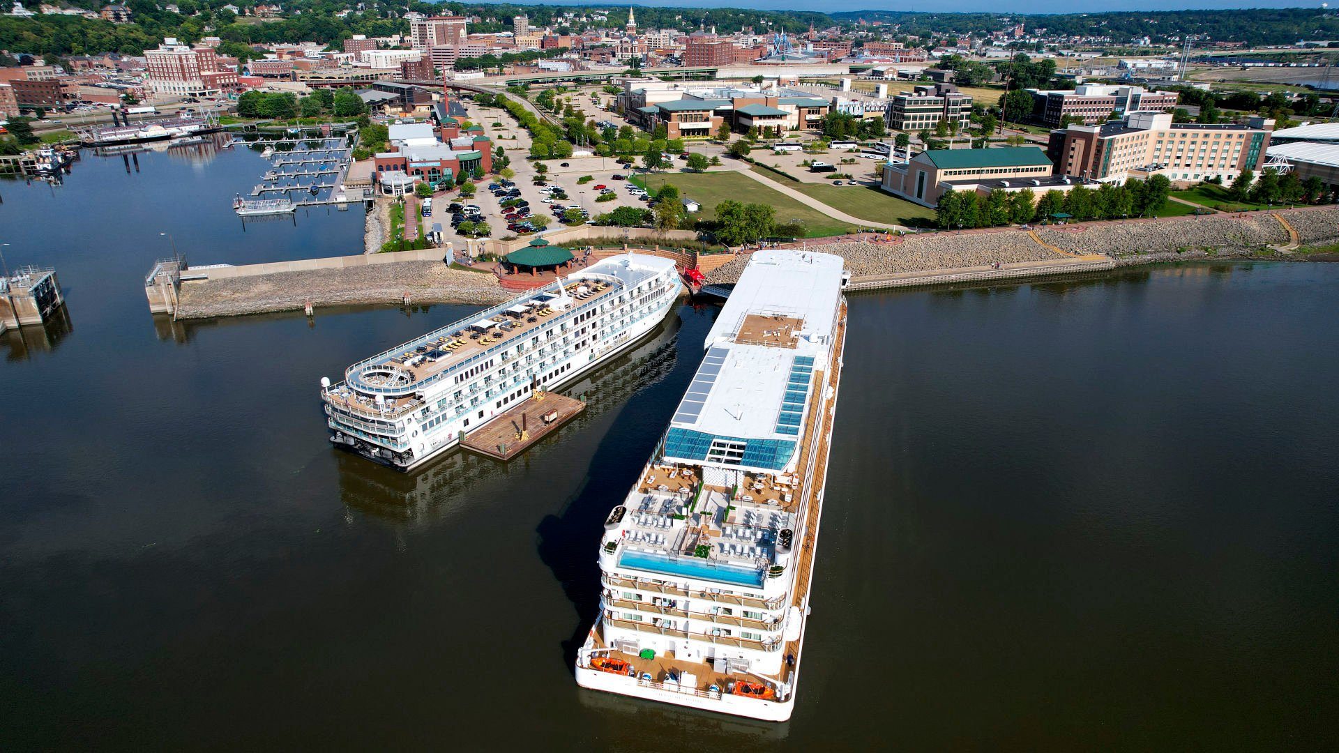 The Viking Mississippi cruise ship (right) docks next to the American Melody at the Port of Dubuque on Tuesday, Sept. 6, 2022.    PHOTO CREDIT: Dave Kettering