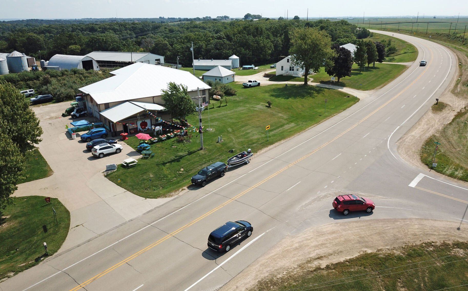 Czipar’s Orchard south of Dubuque on Thursday. The popular seasonal business attracts customers who park along the shoulder of U.S. 52 at its intersection with Schueller Heights road, creating safety concerns.    PHOTO CREDIT: JESSICA REILLY
