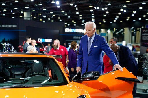 President Joe Biden gets into a Corvette during a tour of the Detroit Auto Show, Wednesday, Sept. 14, 2022, in Detroit. (AP Photo/Evan Vucci)    PHOTO CREDIT: Evan Vucci