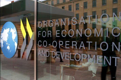 The Organization for Economic Co-operation and Development says Russia’s war in Ukraine and the lingering effects of the COVID-19 pandemic are dragging down global economic growth more than expected and driving up inflation that will stay high into next year.    PHOTO CREDIT: Francois Mori