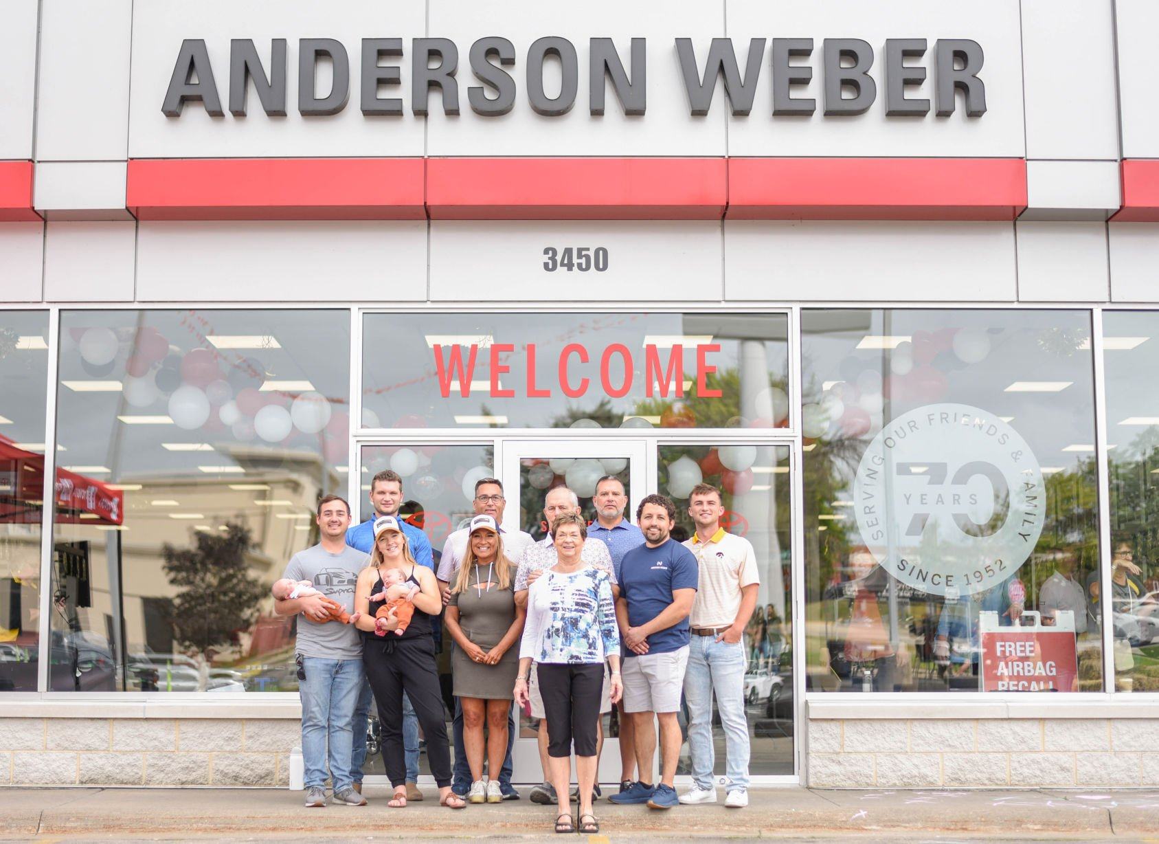 Four generations of the Weber family stand outside Anderson-Weber Toyota in Dubuque.    PHOTO CREDIT: Contributed