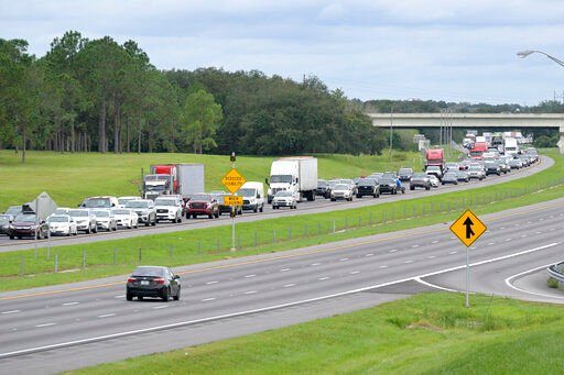 Eastbound traffic crowds Interstate 4 as people evacuate in preparation for Hurricane Ian approaches the western side of the state, Tuesday, Sept. 27, 2022, in Lake Alfred, Fla. (AP Photo/Phelan M. Ebenhack)    PHOTO CREDIT: Phelan M. Ebenhack