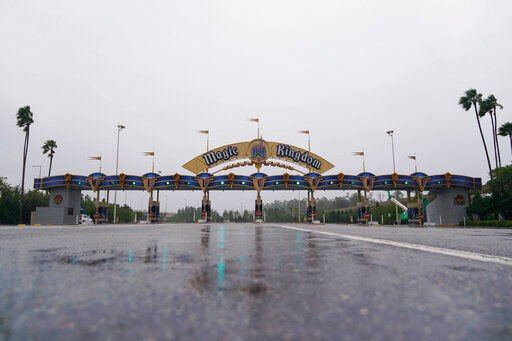 The entrance to the Walt Disney theme park is seen as the park is closed as Hurricane Ian bears down on Florida, Wednesday, Sept. 28, 2022, in Lake Buena Vista, Fla. (AP Photo/John Raoux)    PHOTO CREDIT: John Raoux