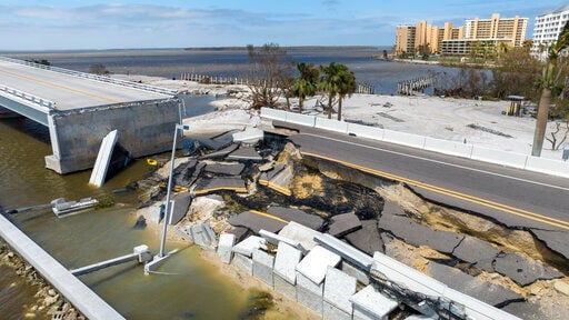 A section of the Sanibel Causeway was lost due to the effects of Hurricane Ian Thursday, Sept. 29, 2022, in Fort Myers, Fla. (AP Photo/Steve Helber)    PHOTO CREDIT: Steve Helber