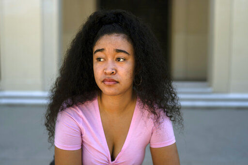 Marina Aina, a 21-year-old student majoring in American Studies at Pomona College, poses for photos on the school