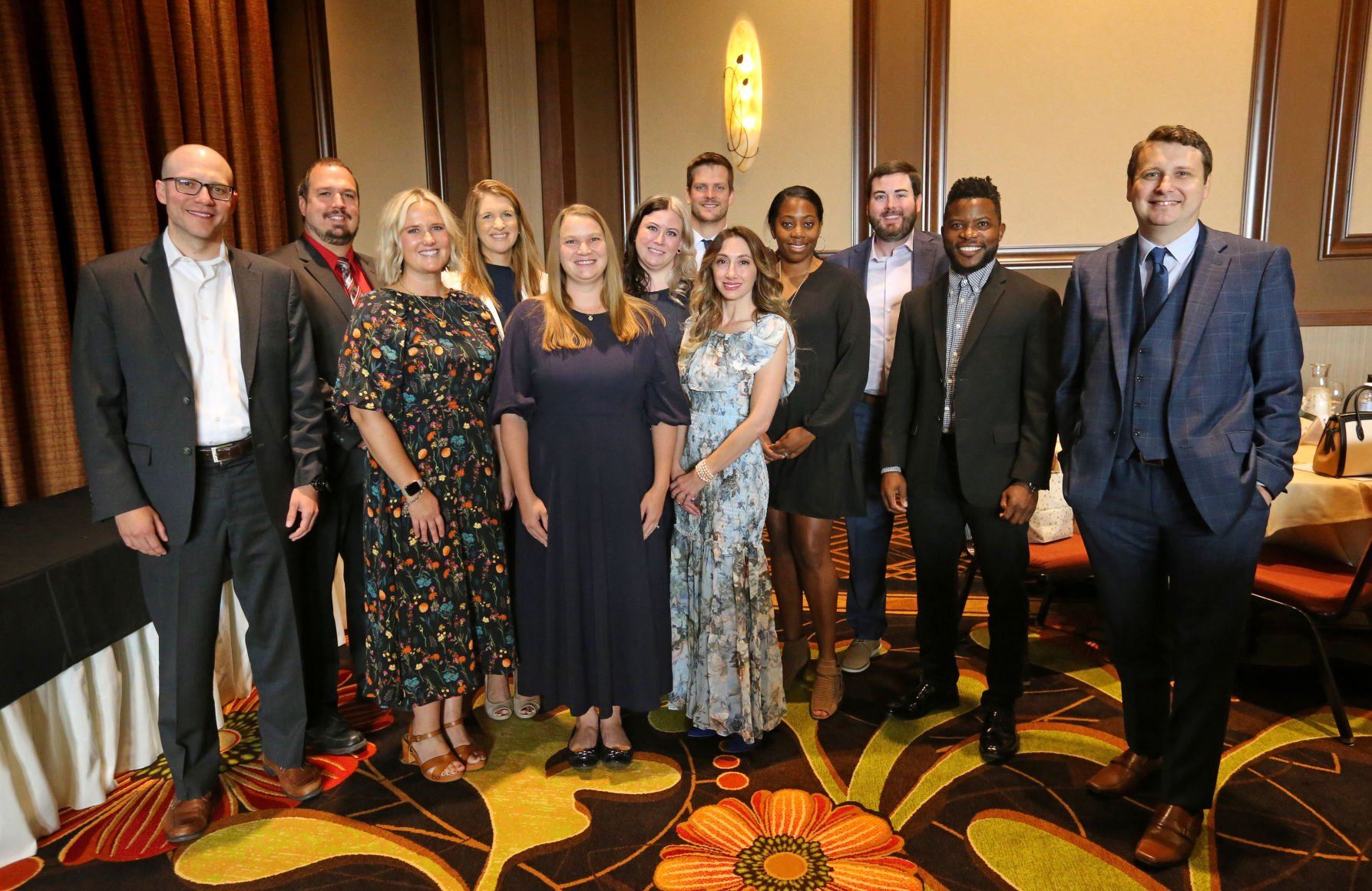 Members of the Rising Star Class of 2022 stand during an awards breakfast at Diamond Jo Casino in Dubuque on Wednesday, Sept. 14.    PHOTO CREDIT: JESSICA REILLY