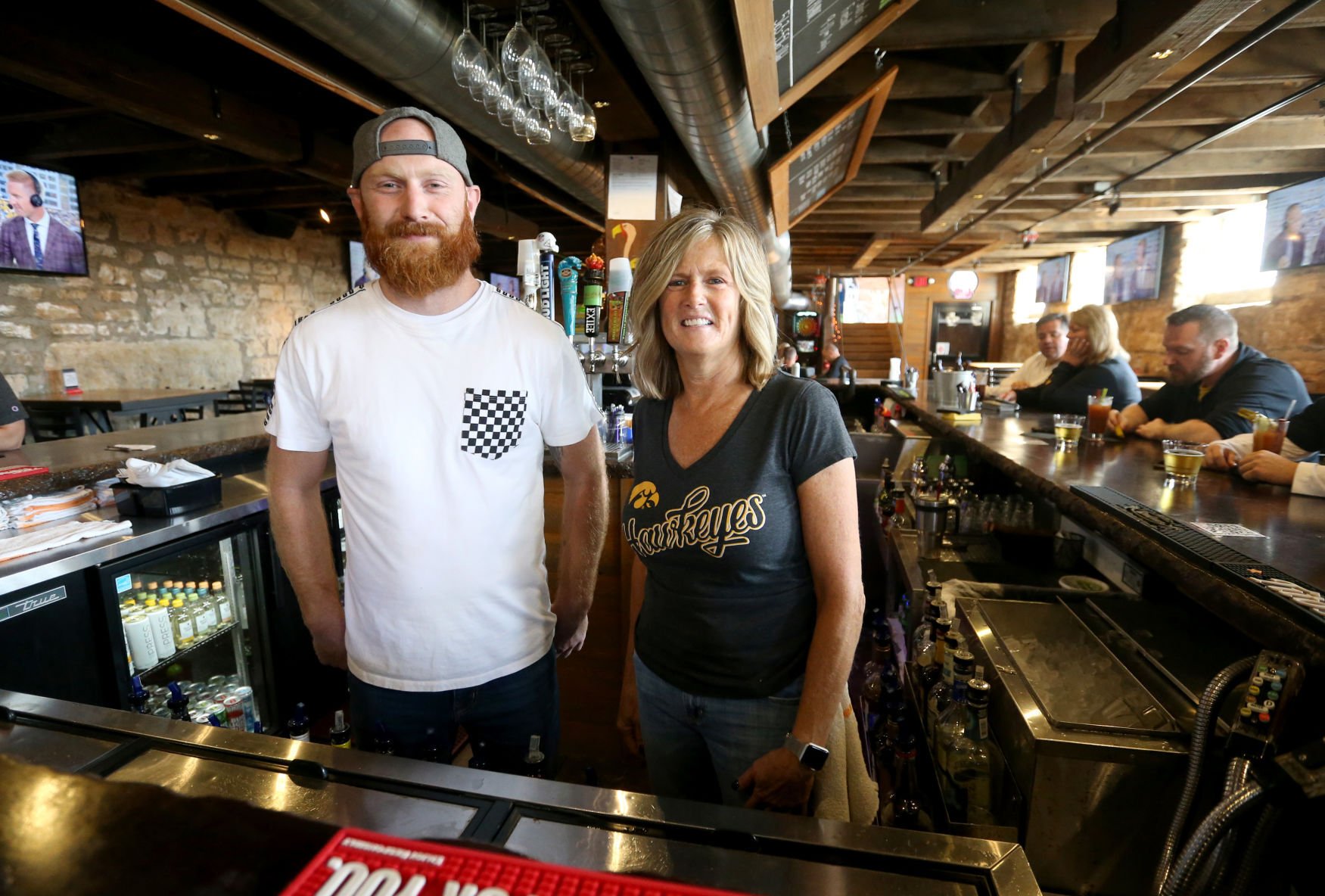Co-owners Jake Roth and Laurie Paulsen stand at The Dungeon in Dubuque on Saturday, Oct. 1, 2022.    PHOTO CREDIT: JESSICA REILLY