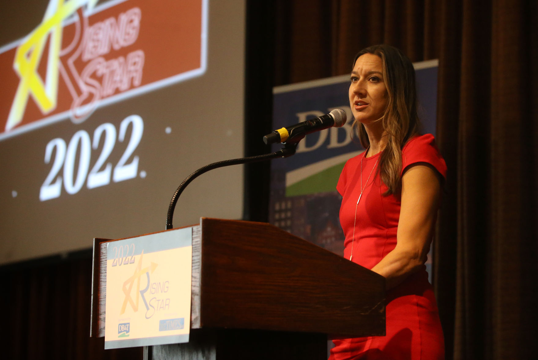 Stacey Hines, with Dubuque Bank & Trust, speaks during the Rising Stars breakfast at Diamond Jo Casino in Dubuque on Wednesday, Sept. 14, 2022. The event was presented by bizTimes.biz and sponsored by Dubuque Bank and Trust.    PHOTO CREDIT: JESSICA REILLY
