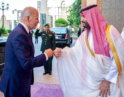 President Joe Biden bumps fists with Saudi Crown Prince Mohammed bin Salman at Al-Salam palace in Jeddah, Saudi Arabia, on July 15.    PHOTO CREDIT: Bandar Aljaloud