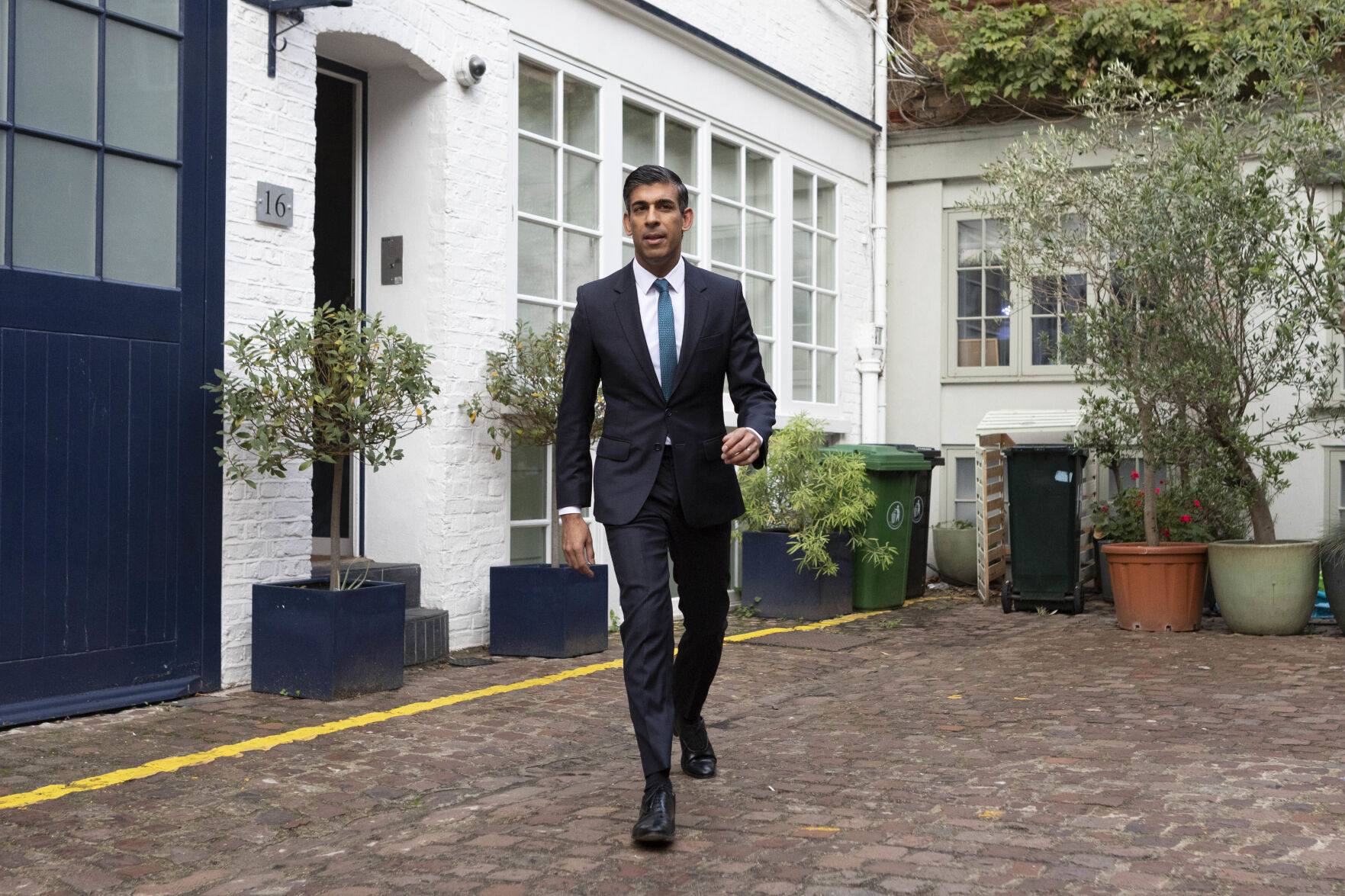 <p>Rishi Sunak outside his home in London, following the resignation of Liz Truss as Prime Minister, Friday Oct. 21, 2022. British Prime Minister Liz Truss resigned Thursday, bowing to the inevitable after a tumultuous, short-lived term in which her policies triggered turmoil in financial markets and a rebellion in her party that obliterated her authority. (Beresford Hodge/PA via AP)</p>   PHOTO CREDIT: Beresford Hodge - foreign subscriber, PA