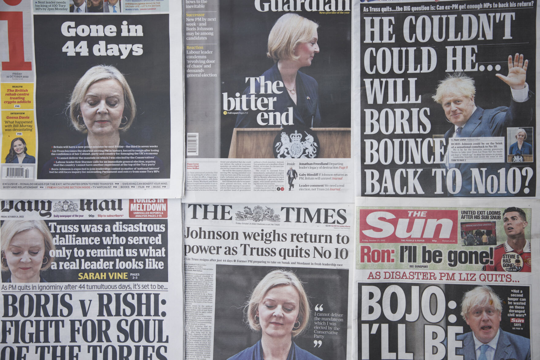 <p>A selection of the front pages of British national newspapers showing the reaction the the resignation of Prime Minister Liz Truss, in central London, Friday, Oct. 21, 2022. British Prime Minister Liz Truss resigned Thursday, bowing to the inevitable after a tumultuous, short-lived term in which her policies triggered turmoil in financial markets and a rebellion in her party that obliterated her authority. (AP Photo/David Cliff)</p>   PHOTO CREDIT: David Cliff - stringer, AP