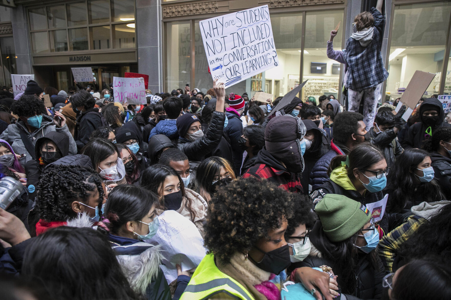 <p>FILE - Chicago Public Schools students protest outside the Chicago Public Schools headquarters during a district-wide walkout to demand officials include them in the conversation about COVID-19 safety in schools in Chicago, on Jan. 14, 2022. From March 2020 to June 2021, the average student in Chicago lost 21 weeks of learning in reading and 20 weeks in math, equivalent to missing half a year of school, according to Georgetown University’s Edunomics Lab, which analyzed data from a widely used test called MAP to estimate pandemic learning loss for every U.S. school district. (Pat Nabong/Chicago Sun-Times via AP, File)</p>   PHOTO CREDIT: Pat Nabong - member image share, Chicago Sun-Times