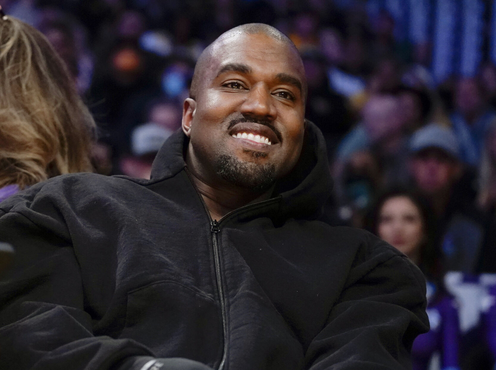 <p>FILE - Kanye West watches the first half of an NBA basketball game between the Washington Wizards and the Los Angeles Lakers in Los Angeles, on March 11, 2022 A completed documentary about the rapper formerly known as Kanye West has been shelved amid his recent slew of antisemitic remarks.. (AP Photo/Ashley Landis, File)</p>   PHOTO CREDIT: Ashley Landis - staff, AP