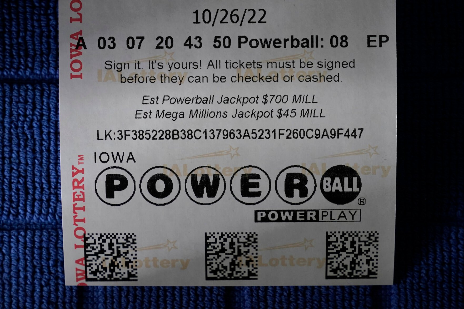 <p>A Powerball ticket showing the estimated jackpot of $700 million is displayed, Tuesday, Oct. 25, 2022, in Urbandale, Iowa. The eighth-largest lottery jackpot will be up for grabs Wednesday night when numbers are drawn for an estimated $700 million Powerball grand prize. (AP Photo/Charlie Neibergall)</p>   PHOTO CREDIT: Charlie Neibergall