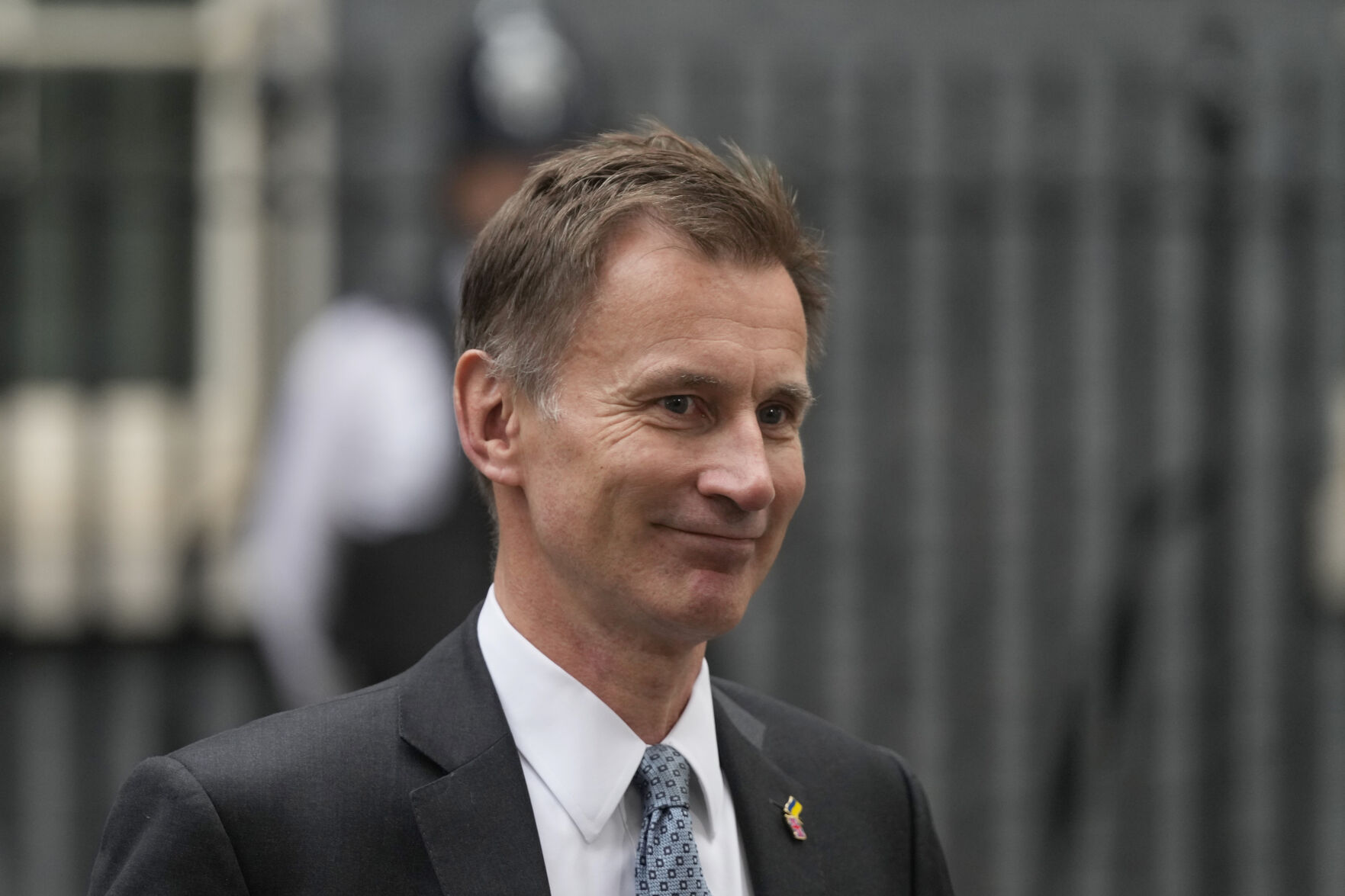 <p>Jeremy Hunt, the Chancellor of the Exchequer leaves 10 Downing Street following a Cabinet meeting, the first held by the new British Prime Minister Rishi Sunak, in London, Wednesday, Oct. 26, 2022. Sunak was elected by the ruling Conservative party to replace Liz Truss who resigned. (AP Photo/Frank Augstein)</p>   PHOTO CREDIT: Frank Augstein - stringer, AP
