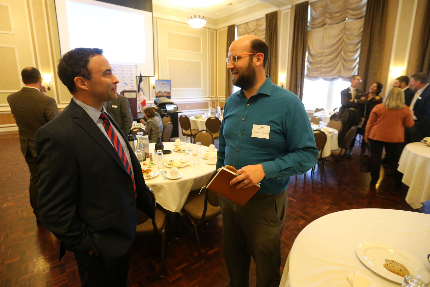 Cavanagh (left) speaks with Samuel Fleming.    PHOTO CREDIT: JESSICA REILLY