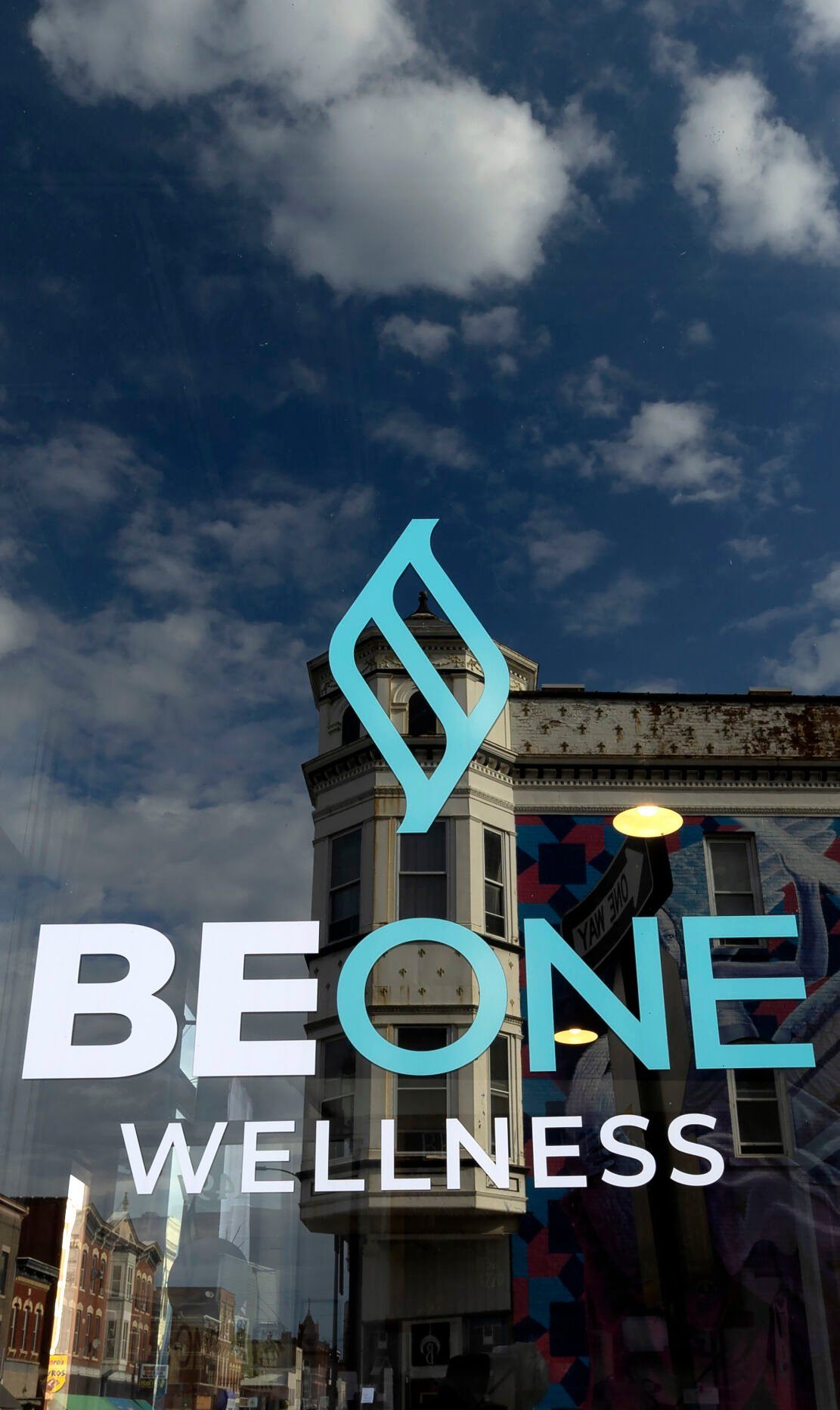 The window sign of Be One Wellness.    PHOTO CREDIT: Stephen Gassman