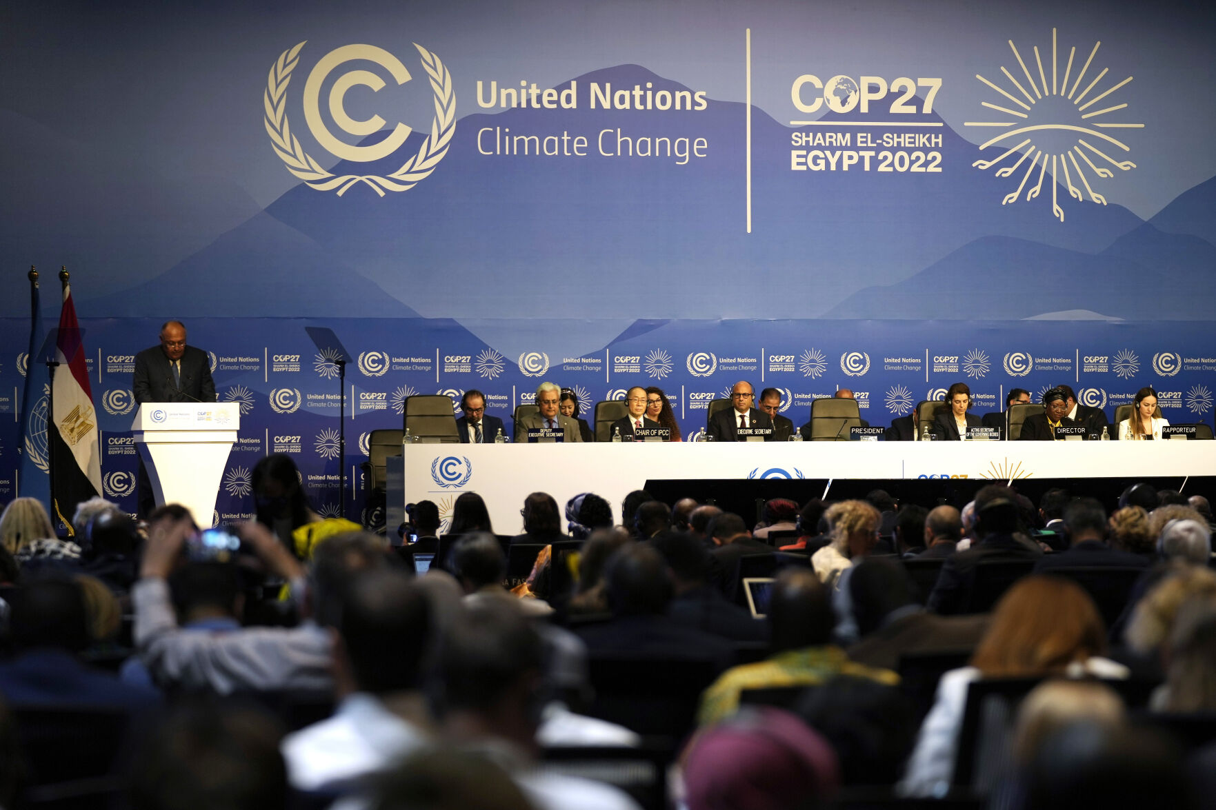 <p>FILE - Sameh Shoukry, president of the COP27 climate summit, left, speaks during an opening session at the COP27 U.N. Climate Summit, Sunday, Nov. 6, 2022, in Sharm el-Sheikh, Egypt. Nearly 50 heads of states or governments on Monday will take the stage in the first day of “high-level” international climate talks in Egypt with more to come in following days. (AP Photo/Peter Dejong, File)</p>   PHOTO CREDIT: Peter Dejong - staff, AP