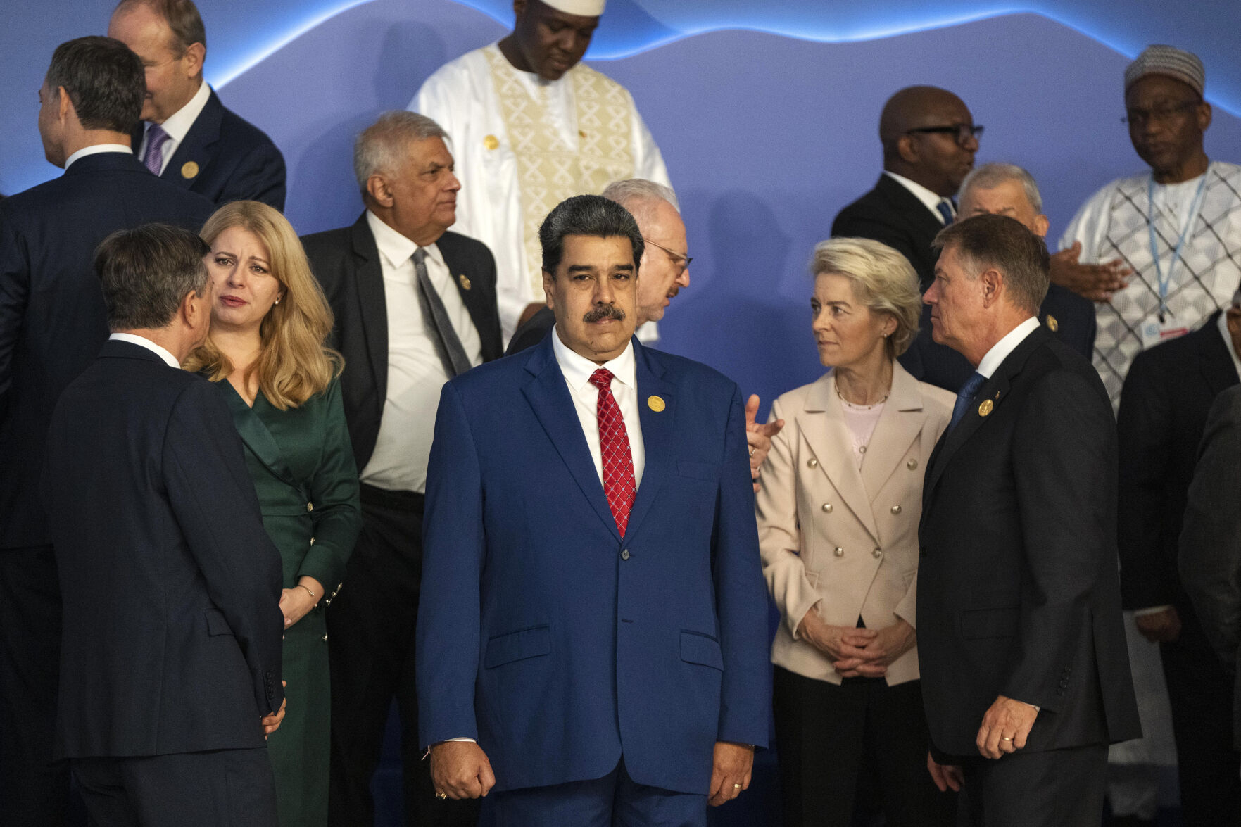 <p>The President of Venezuela, Nicolás Maduro Moros, center, stands next to the President of the European Commission Ursula von der Leyen, center center right, as leaders prepare themselves for a group photo at the COP27 U.N. Climate Summit, in Sharm el-Sheikh, Egypt, Monday, Nov. 7, 2022. (AP Photo/Nariman El-Mofty)</p>   PHOTO CREDIT: Nariman El-Mofty - staff, AP