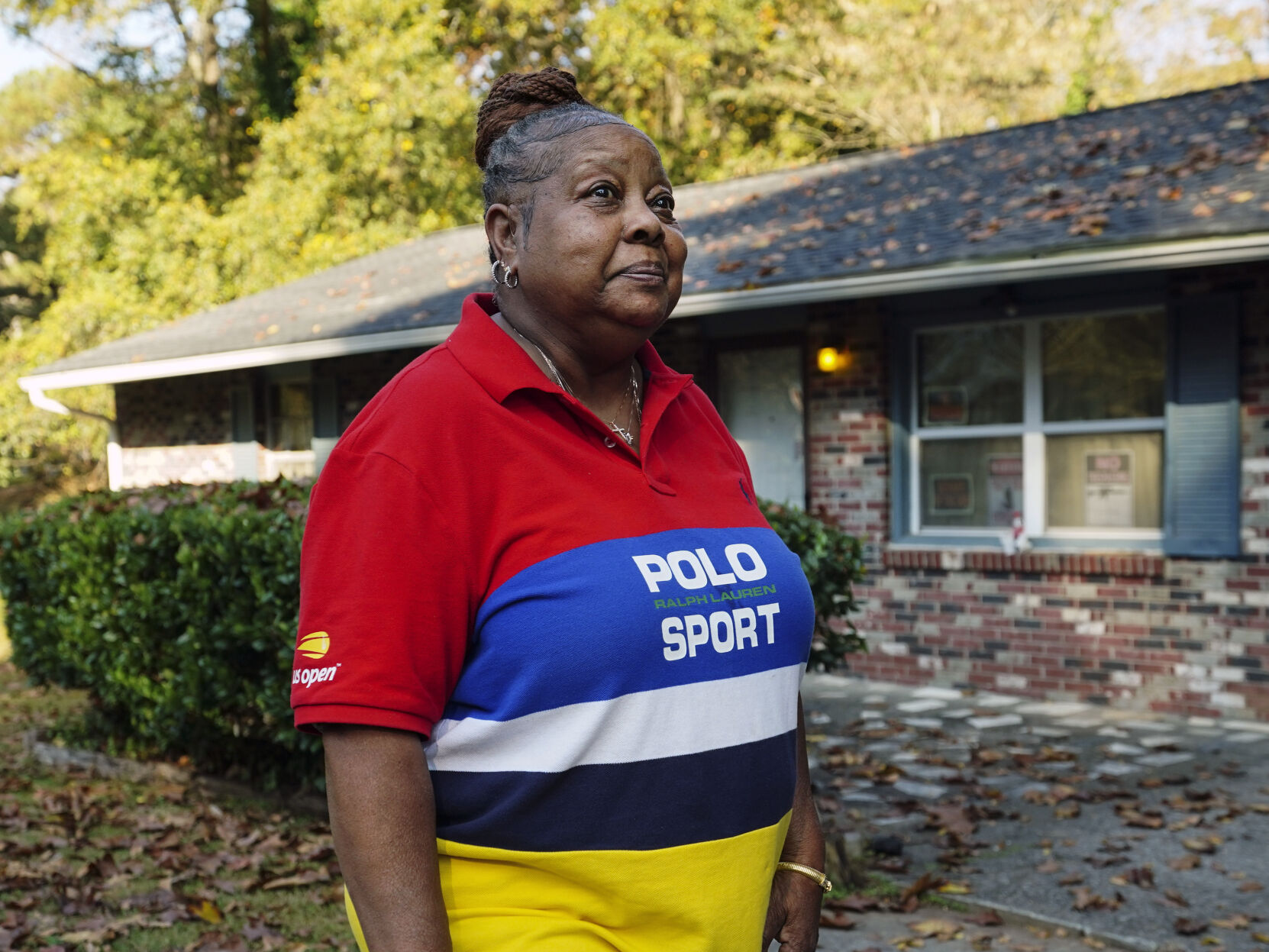 <p>Georgia voter Cynthia Jones speaks in front of her home where she and her disabled sister live, Thursday, Nov. 3, 2022, in Atlanta. The Atlanta native sees a country split between haves and have nots. (AP Photo/John Bazemore)</p>   PHOTO CREDIT: John Bazemore - staff, AP