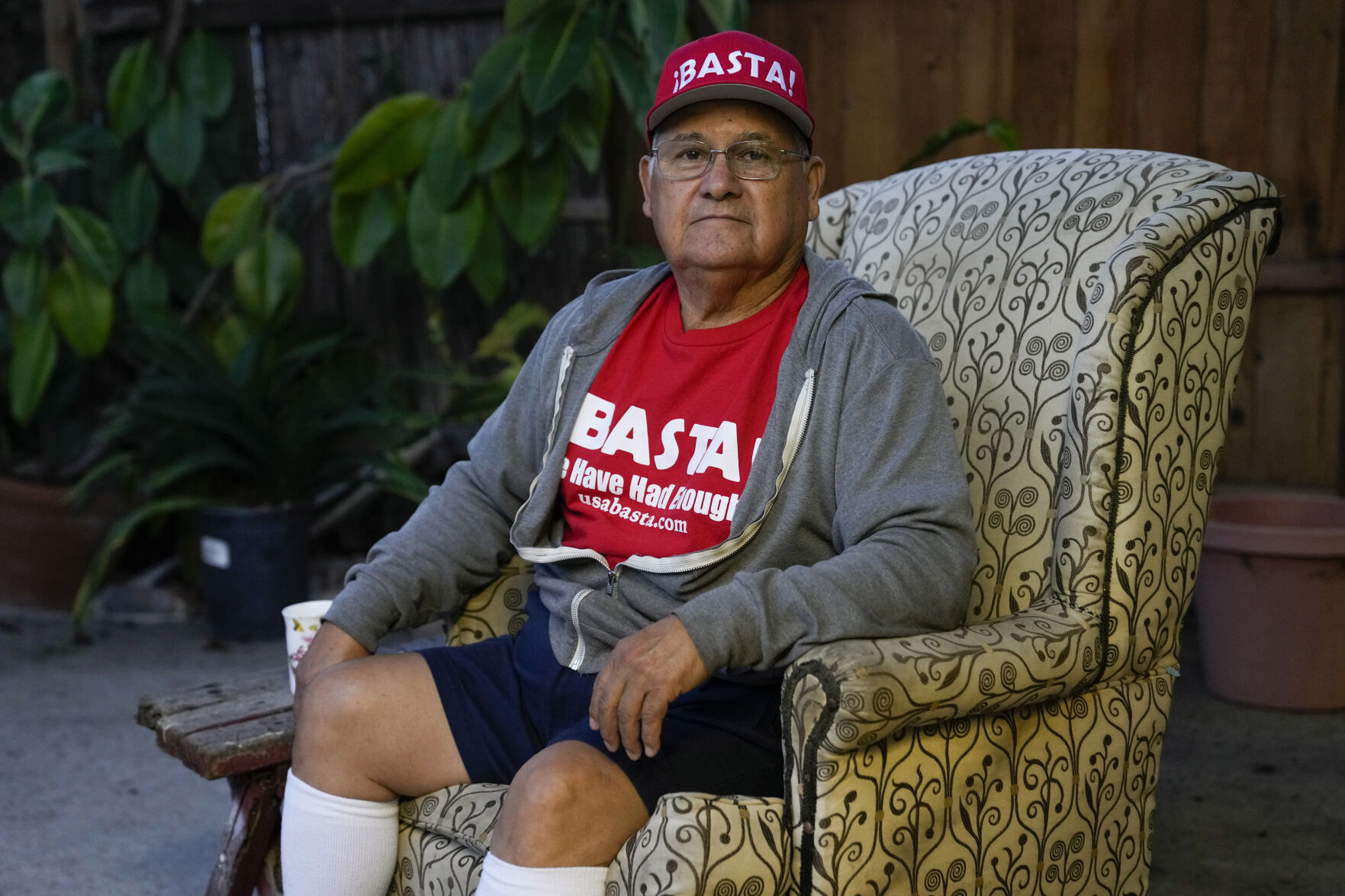 <p>Ron Flores, a Republican, sits on his porch, Thursday, Nov. 3, 2022, in Huntington Beach, Calif. Flores is retired and helps campaign for conservative candidates. (AP Photo/Ashley Landis)</p>   PHOTO CREDIT: Ashley Landis - staff, AP
