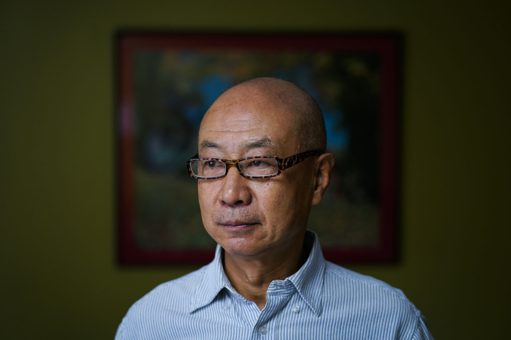 <p>Jerry Cheng poses for a photograph in Philadelphia, Friday, Nov. 4, 2022. The retired mechanical engineer cherishes his ability to participate in democracy...and especially his freedom to criticize politicians. (AP Photo/Matt Rourke)</p>   PHOTO CREDIT: Matt Rourke - staff, AP