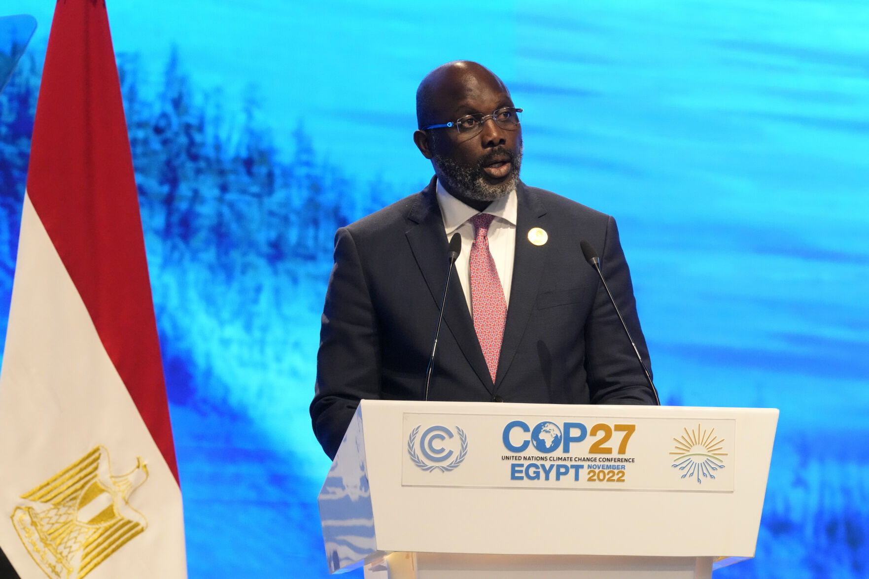 <p>George Manneh Weah, president of Liberia, speaks at the COP27 U.N. Climate Summit, Tuesday, Nov. 8, 2022, in Sharm el-Sheikh, Egypt. (AP Photo/Peter Dejong)</p>   PHOTO CREDIT: Peter Dejong - staff, AP
