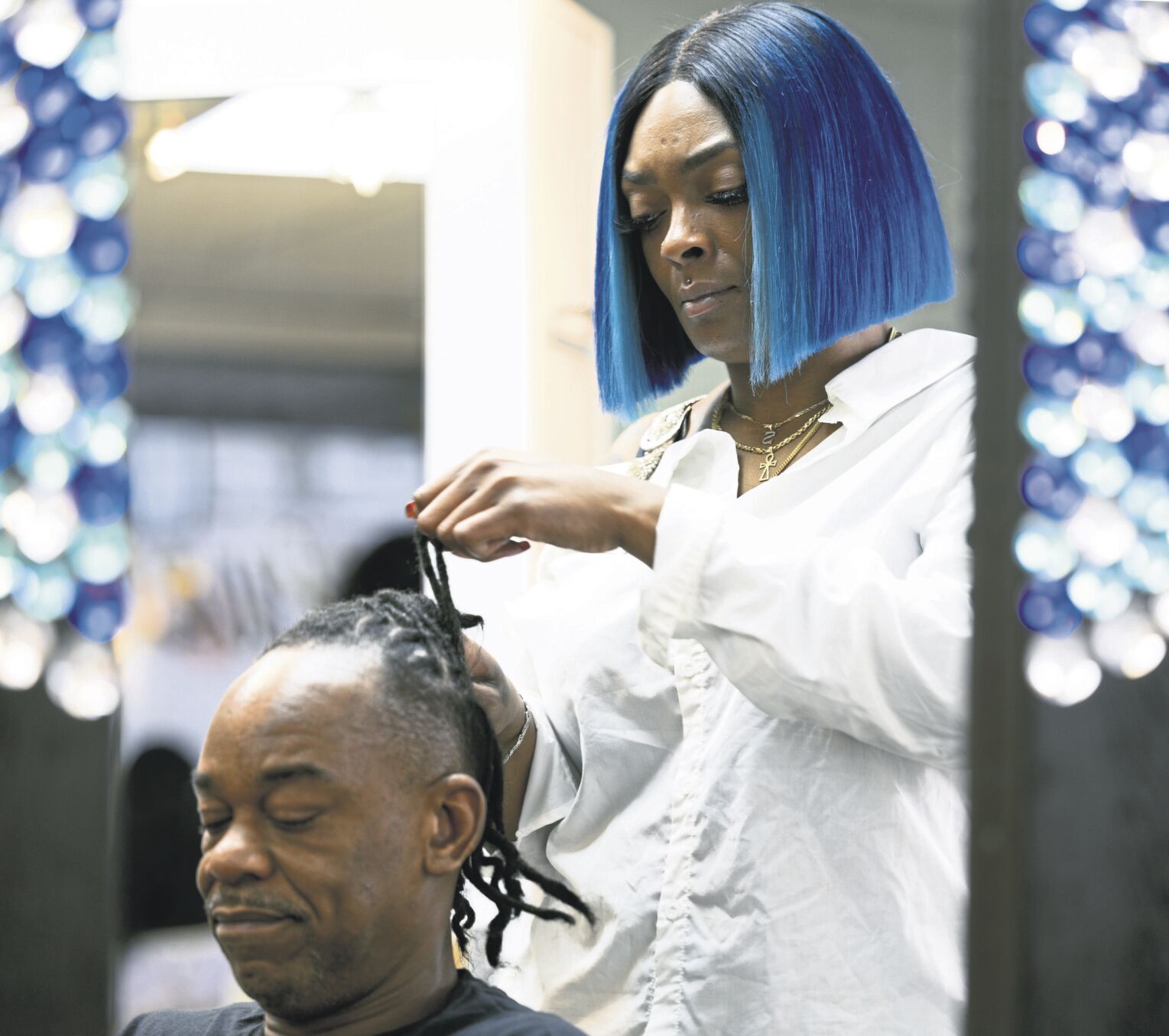 The salon is my happy place': Black hair stylists fill gap in Dubuque  market – 
