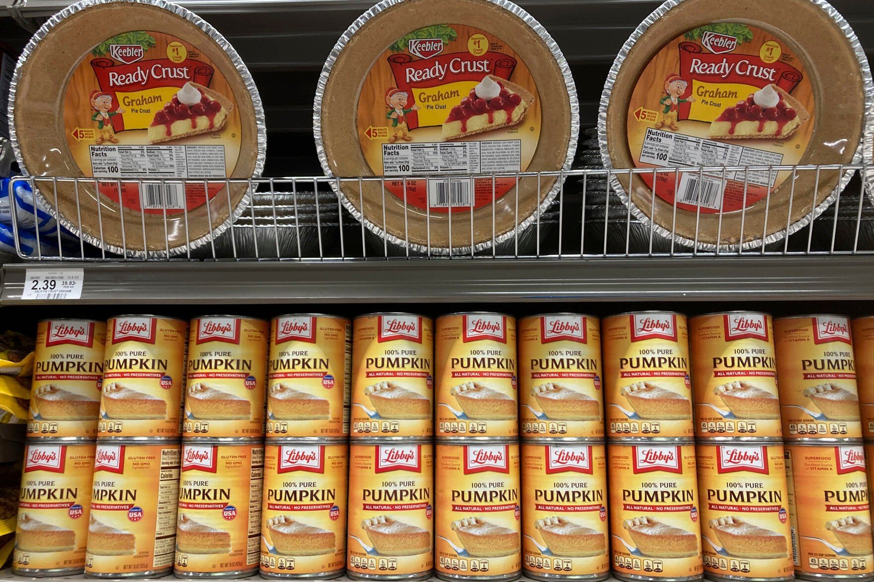 <p>File - Canned pumpkin and graham cracker shell crusts are displayed at a Publix Supermarket, Tuesday, Nov. 16, 2021 in North Miami, Fla. Americans are bracing for a costly Thanksgiving this year, with double-digit percent increases in the price of turkey, potatoes, stuffing, canned pumpkin and other staples. (AP Photo/Marta Lavandier, File)</p>   PHOTO CREDIT: Marta Lavandier 