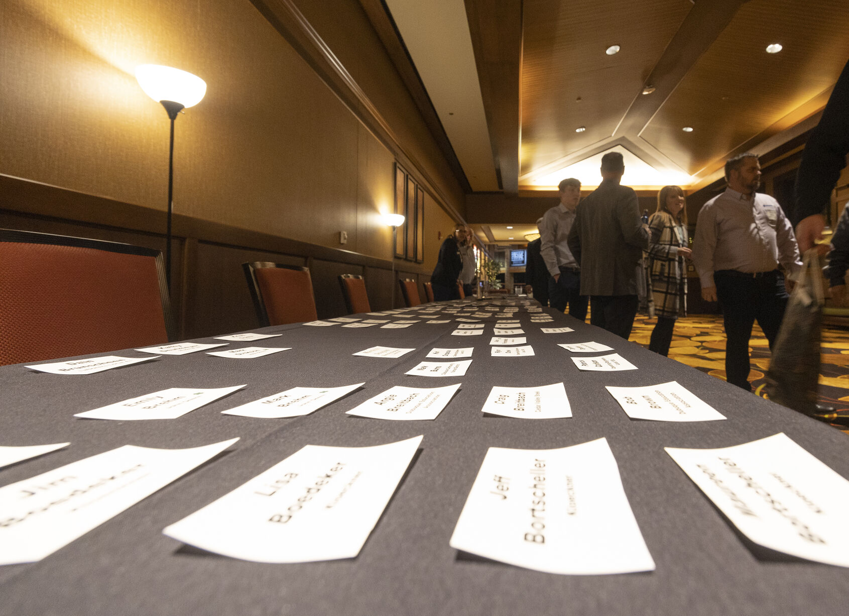 Name badges line the check in table.    PHOTO CREDIT: Stephen Gassman